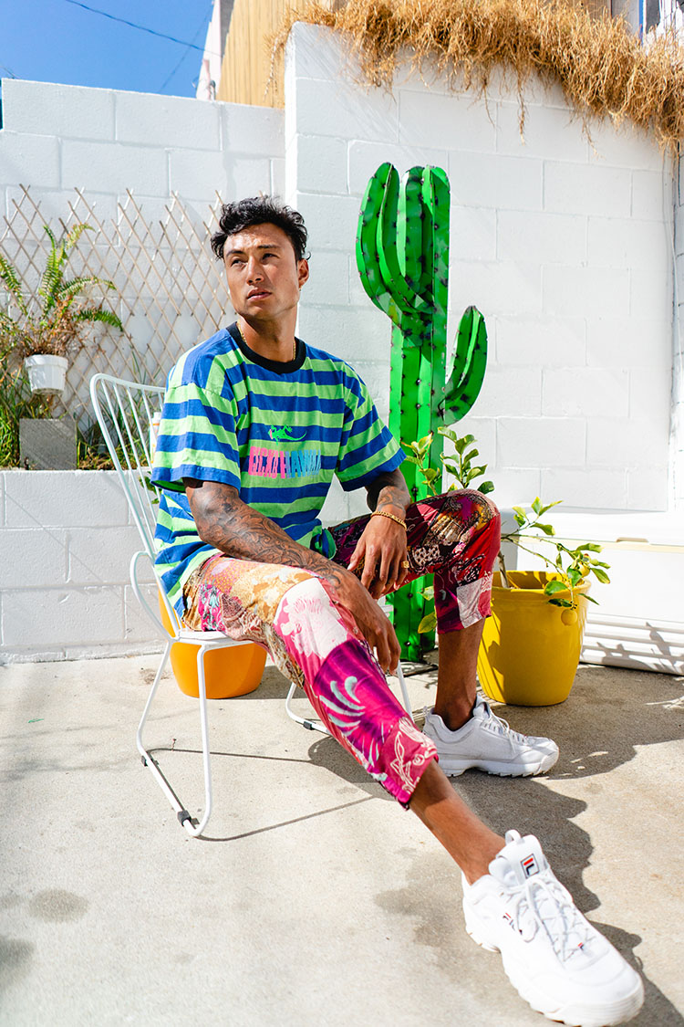 Man in colorful clothes outside